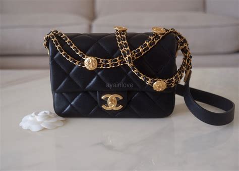 CHANEL Caviar Quilted Mini Twist Your Buttons Flap Black 